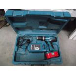 A Makita drill in case