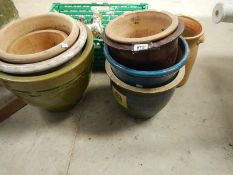 8 garden plant pots.