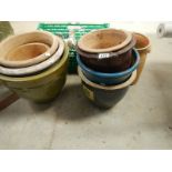 8 garden plant pots.