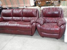 A tan 3 seater sofa and armchair.