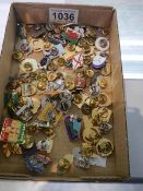 A mixed lot of pin badges.