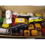 Box of die-cast toy vans