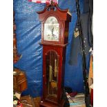 A 31 day modern 5ft long case clock.