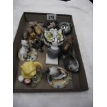 A box of miscellaneous items including Goebel & Royal Doulton Winnie The Pooh etc.