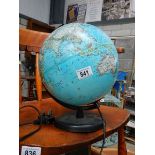 An illuminating world globe.