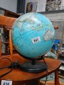 An illuminating world globe.