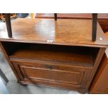 An oak television cabinet.