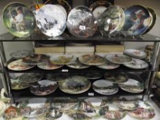 A large lot of collectors plates, by Royal Doulton, Border Fine Arts, Danbury Mint etc.