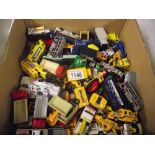 Box of die-cast toy trucks and buses