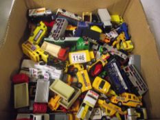 Box of die-cast toy trucks and buses