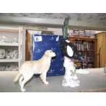 A Sitzendorf bird & a boxed Border Fine Arts dog figure