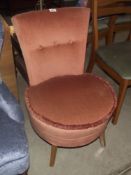 A button upholstered nursing chair