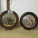 2 Prattware pot lids in oak frames.