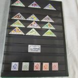 An album of mainly mint Channel Island stamps including sets and pairs