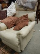 A reclining arm chair.