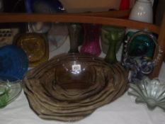 A large quantity of coloured Art Glass bowls and vases etc