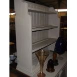 A shabby chich painted pine kitchen wall hanging shelf unit