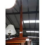 A tall oak coat stand.