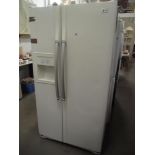 A large LG fridge with icemaker