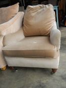 An oyster arm chair in good condition.