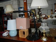 A quantity of electric table lamps.