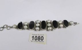 A vintage cased silver stone set bracelet, marked 925.