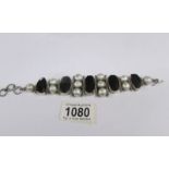 A vintage cased silver stone set bracelet, marked 925.