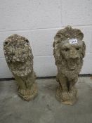 A pair of lion newel post tops, 21".