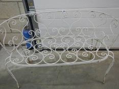 A metal garden seat.