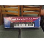 A Casiotone MT-55 electronic keyboard