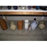 A quantity of stoneware and hot water bottles etc