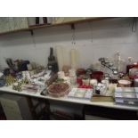 A large lot of candles, candle holders, candle snuffers, tealights etc.