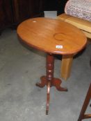 A Victorian mahogany tip-up side table