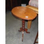 A Victorian mahogany tip-up side table