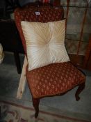 A French style Queen Anne leg bedroom chair.