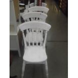 A set of 4 painted pine kitchen chairs