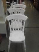 A set of 4 painted pine kitchen chairs