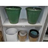 2 shelves of pots.