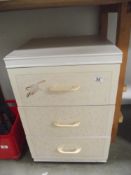 A 3 drawer bedside cabinet