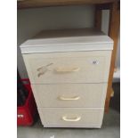 A 3 drawer bedside cabinet