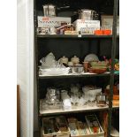 4 shelves of kitchen ware including new saucepans.
