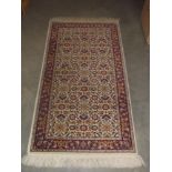 An Eastern wool rug size 61 x 160 cm