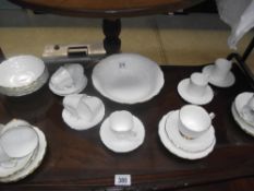 An set of Aynsley Golden Crown tea cups and saucers with other Aynsley porcelain items