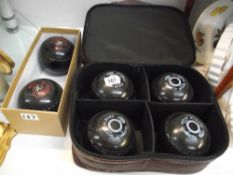 An old bowls bag with 4 Almark Clubmaster bowls (medium) and 2 Drakes Pride professional bowls