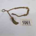 A yellow metal watch chain marked 'gold' on clasp, tests for 9ct, 16.6 grams.