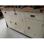 A vintage (circa 1950's) metal kitchen cabinet, missing top.