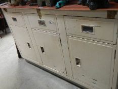 A vintage (circa 1950's) metal kitchen cabinet, missing top.