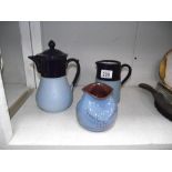 A good teapot and matching jug and a piece of motto ware 'Sunshine makes shadows'