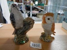 A Beswick Lesser Spotted Woodpecker, No.2420 (tail has minute flee bite) and a Beswick Owl No.2026.