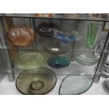 A large quantity of coloured glass dishes etc.